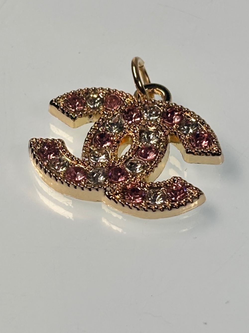 Chanel Gold-Tone Interlocking CC Pendant with Pink and Clear Crystals